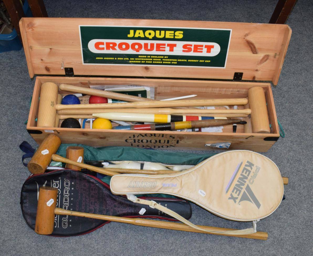 Lot 1013 - A Jaques croquet set in fitted wooden case, two badminton rackets, a garden bowls set and a...