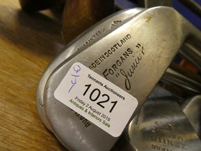 Lot 1021 - A group of hickory shafted and other golfclubs, some made in Scotland, complete with bag and a...