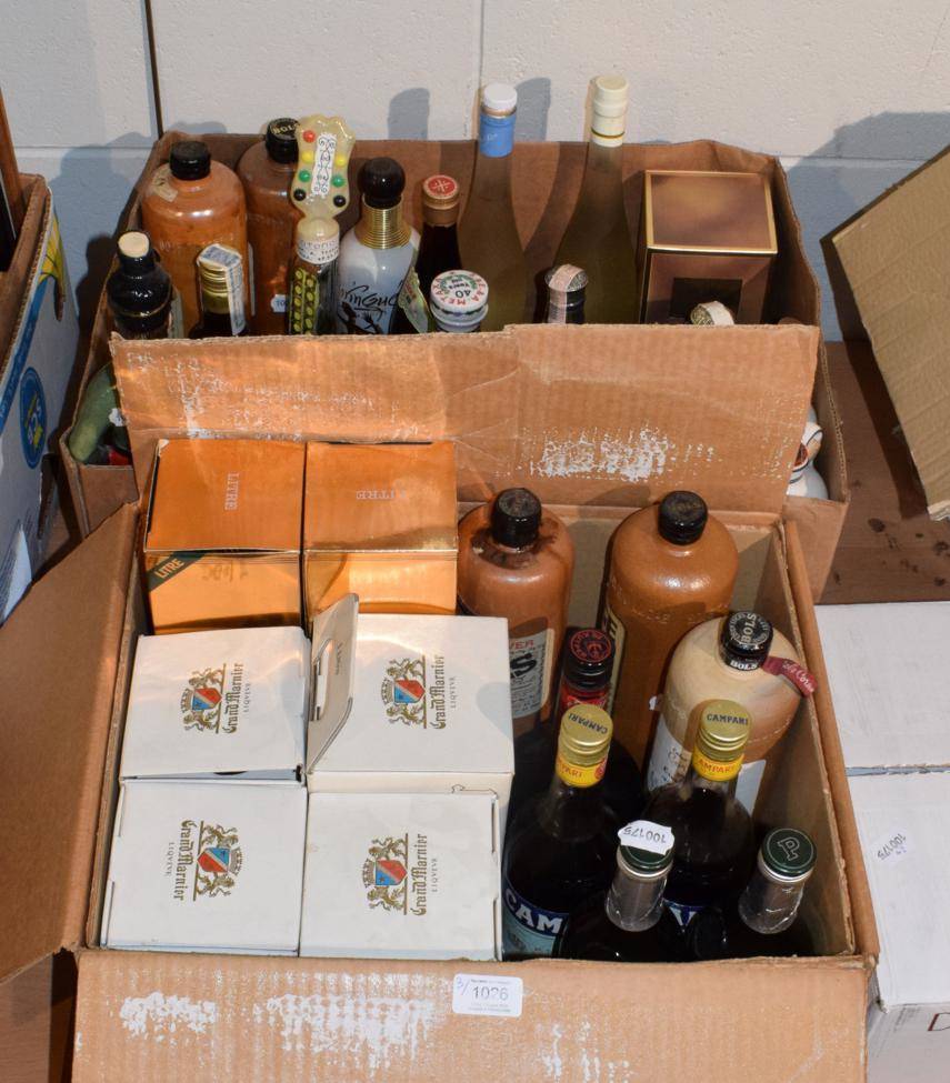 Lot 1026 - Two boxes of assorted spirits including Grand Marnier, Pernod, Campari, Harveys Bristol Cream,...