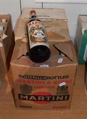 Lot 1032 - Twelve 1.5 ltr bottles of Martini Extra Dry in two original cardboard boxes, together with six...