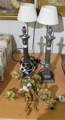 Lot 1040 - A pair of Laura Ashley silvered column table lamps, another pair of modern table lamps, a pair...