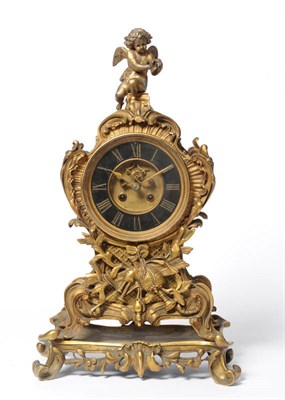 Lot 1352 - A French Gilt Brass Striking Mantel Clock, circa 1880, the elaborate case surmounted with a...