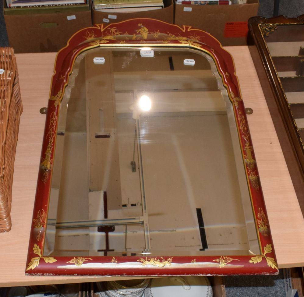 Lot 1059 - A red chinoiserie framed mirror