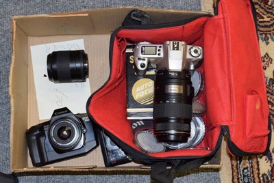 Lot 1067 - Canon EOS650 & EOS300 and three lenses