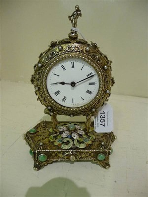 Lot 1357 - A Continental White Metal and Enamel Timepiece, Late 19th century, the elaborate case surmounted by