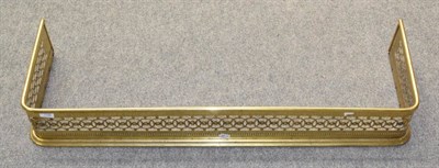 Lot 1198 - A pierced brass fender