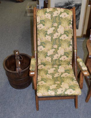 Lot 1202 - An iron bound staved wood well bucket; and an oak framed folding steamer chair (2)