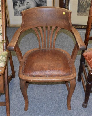 Lot 1203 - An early 20th century elm office chair, made in High Wycombe