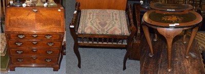 Lot 1206 - A Georgian style bureau form TV cabinet; a mahogany piano stool; and a pair of marquetry tables