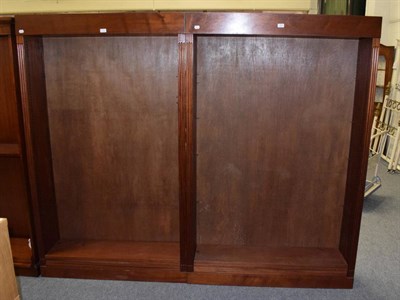 Lot 1219 - A pair of open bookcases with adjustable shelves