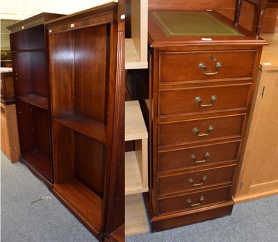 Lot 1220 - Two reproduction open bookcases with adjustable shelves; together with a reproduction leather inset
