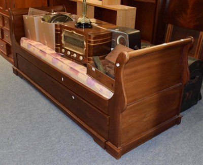 Lot 1226 - A single mahogany sleigh bed with pull out second bed, two mattresses