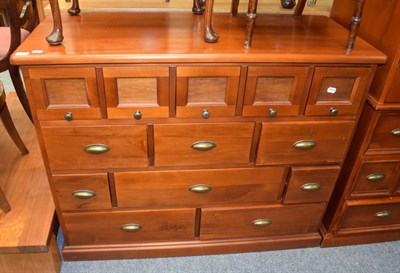 Lot 1228 - A large chest of drawers (ensuite to previous lot)