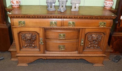 Lot 1253 - A large late Victorian carved oak sideboard