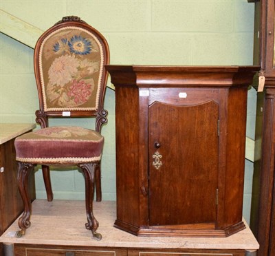 Lot 1267 - Victorian carved mahogany prie dieu with petit point upholstery and a mahogany corner cupboard (2)