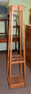 Lot 1271 - An early 20th century oak four-section hall stand, of tapering square section form