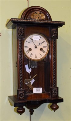 Lot 1276 - A late 19th century musical wall clock, by Junghans, Roman dial, case of architectural form