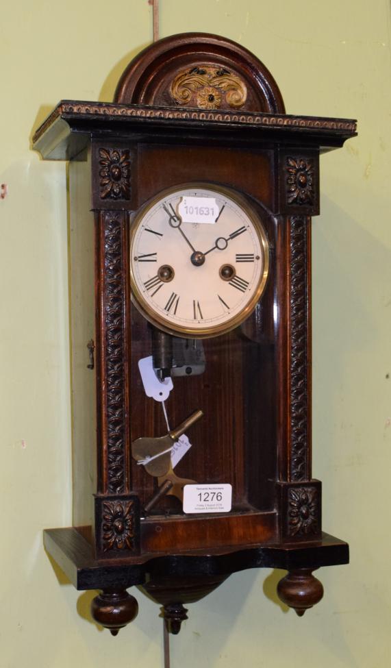 Lot 1276 A late 19th century musical wall clock by