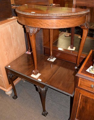 Lot 1298 - A 1920's mahogany demi lune fold over card table on ball and claw feet; and a similar drop leaf...