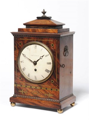 Lot 1376 - A Regency Mahogany and Brass Inlaid Timepiece, the stepped top with a single turned finial,...