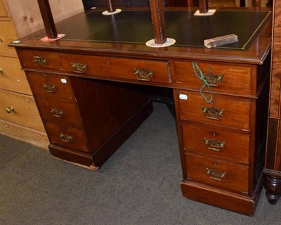 Lot 1305 - An Edwardian leather inset mahogany pedestal desk