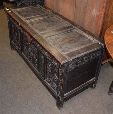 Lot 1309 - A late 17th century joined oak chest, the hinged lid with three moulded panels above a...