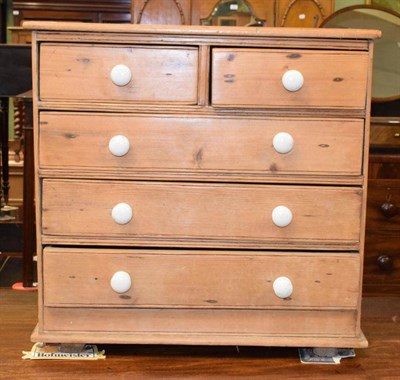 Lot 1314 - A Victorian miniature pine four-height chest of drawers