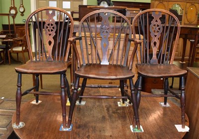 Lot 1316 - Three wheel back ash and elm kitchen chairs