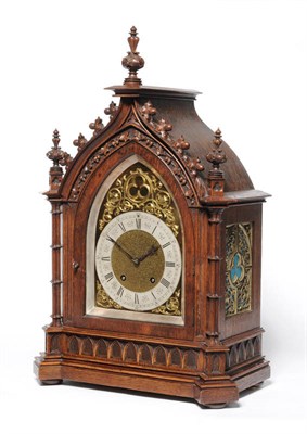 Lot 1378 - An Oak Quarter Striking Mantel Clock, Lenzkirch, circa 1880, the Gothic style case with carved...