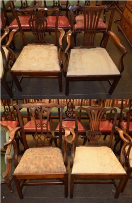 Lot 1335 - Four similar 19th century mahogany open armchairs each with yoke crest rail and pierced splats