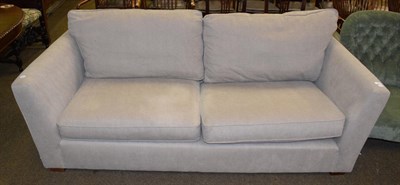 Lot 1345 - A modern four-seater sofa