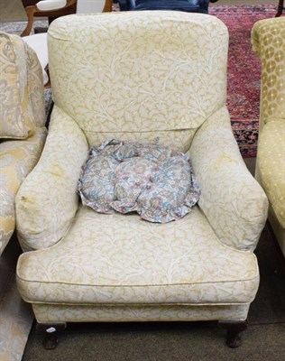 Lot 1356 - An upholstered armchair