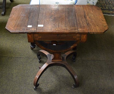 Lot 1358 - A 19th century inlaid rosewood drop leaf work table