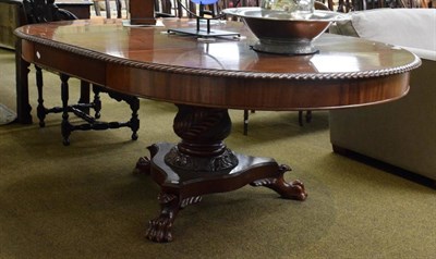Lot 1362 - A mahogany pedestal dining table with single leaf, raised upon a carved and turned pedestal...