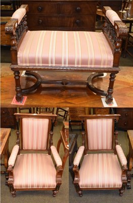 Lot 1367 - A pair of Victorian open armchairs with pink striped upholstered back, seat and arms, and...