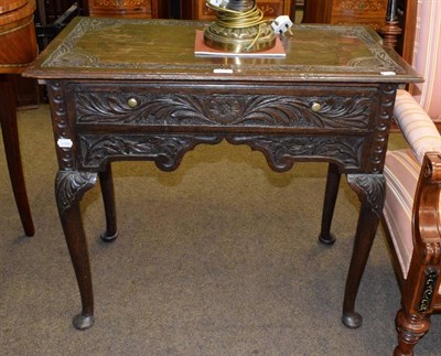 Lot 1370 - An 18th century oak lowboy