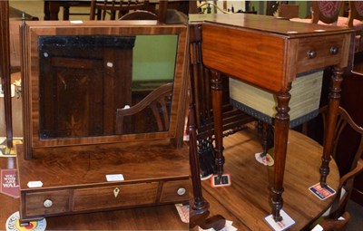 Lot 1389 - A Victorian mahogany drop leaf sewing table; and a small Regency mahogany toilet mirror (2)