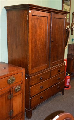 Lot 1394 - An 18th century oak linen press