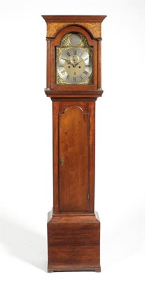 Lot 1386 - A Walnut Eight Day Longcase Clock, the flat top case with brass capped columns, arched trunk...