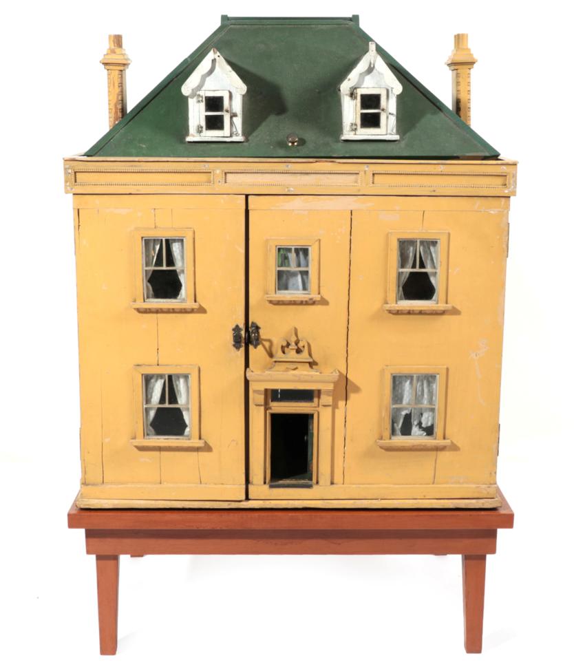 Lot 2000 - Circa 1900 Dolls House, built over three storeys with a cream painted facade, green painted...