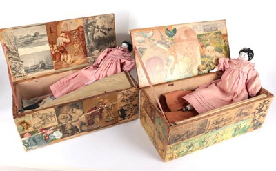 Lot 2006 - Pair of Late 19th Century China Head Dolls, fully clothed in pink cotton long sleeved dresses...
