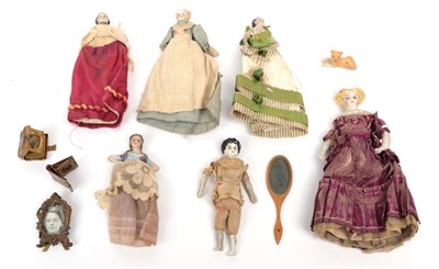 Lot 2009 - 19th Century Dolls House Dolls, comprising a small bisque doll with moulded hair and painted...