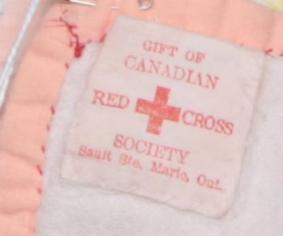 Lot 2019 - Canadian Red Cross Society Quilt 1939-45, incorporating blue and pink printed and plain...
