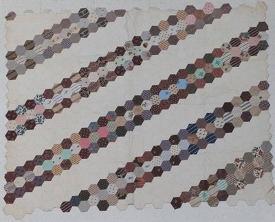 Lot 2025A - Late 19th Century Unfinished Patchwork, comprising paper pieced hexagons with writing visible...