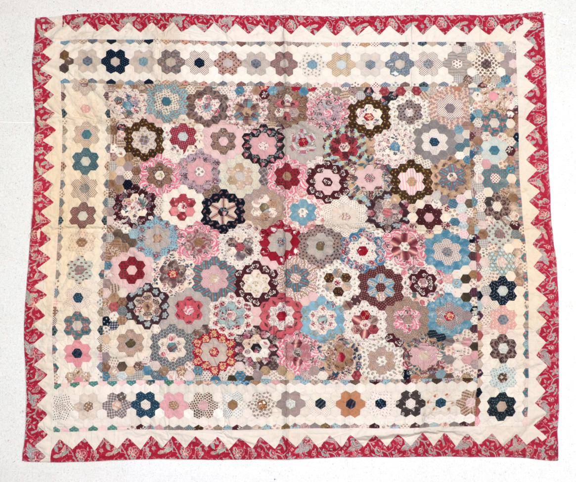 Lot 2039 - Mid 19th Century Hexagonal Patchwork Flower Head Coverlet, with large central square appliquéd...