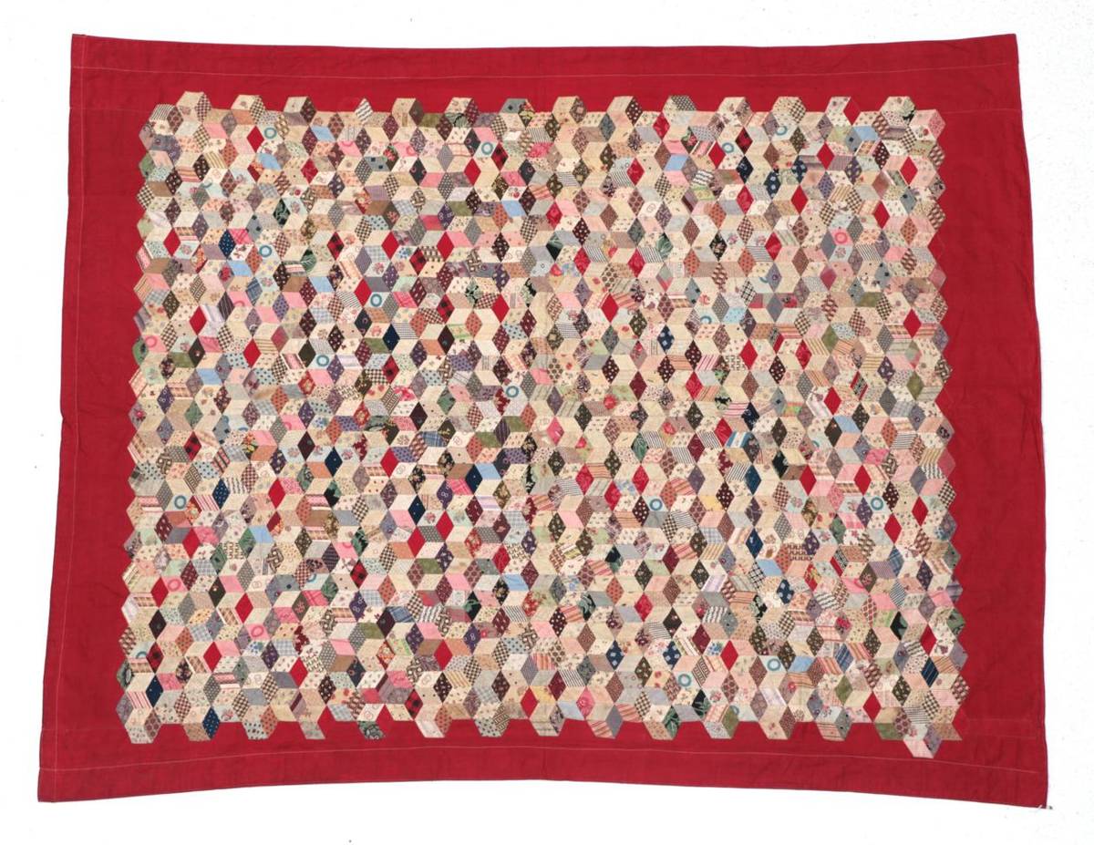 Lot 2040 - 19th Century Patchwork Quilt, in tumbling blocks pattern within a turkey red border,...
