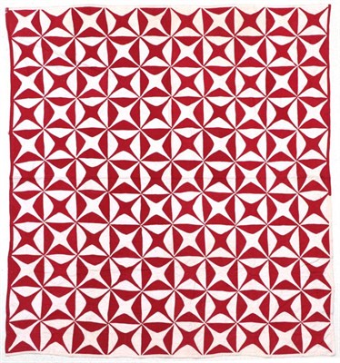 Lot 2046 - 19th Century Turkey Red and White Patchwork Quilt, in the 'Robbing Peter to Pay Paul' pattern,...