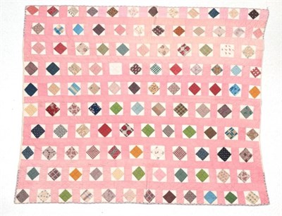 Lot 2047 - 19th Century Patchwork Reversible Quilt, comprising a pink and white fine striped trellis,...