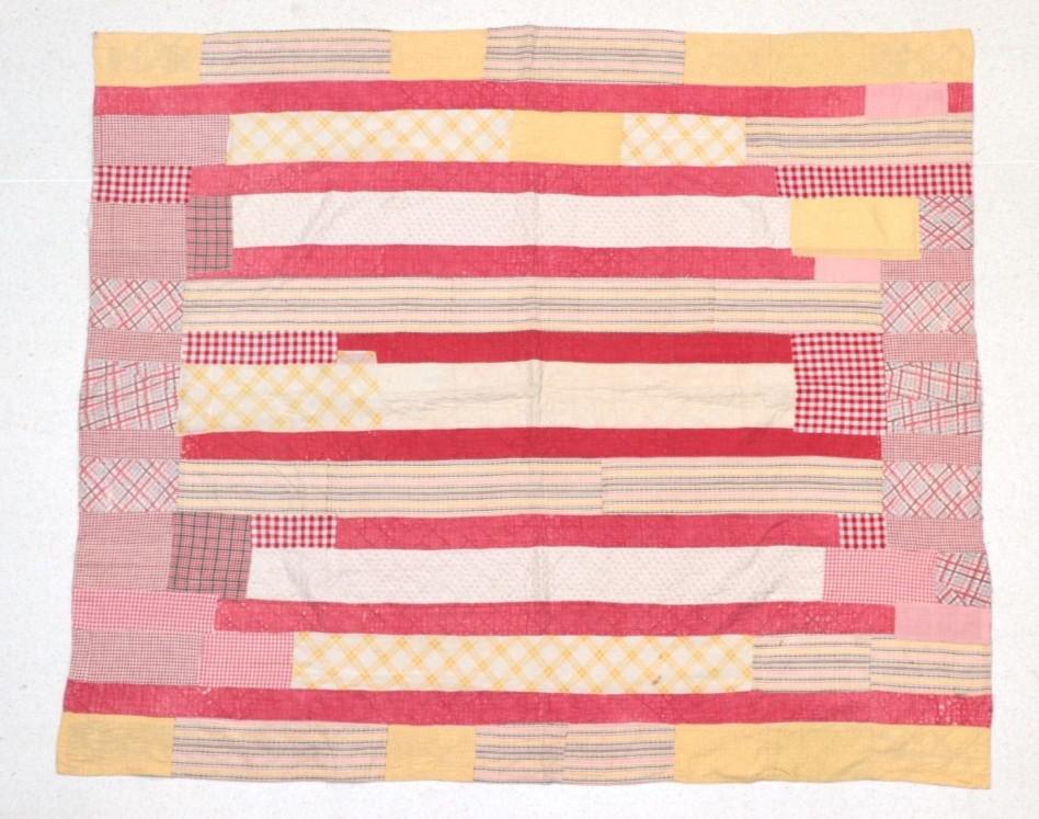 Lot 2049 - Late 19th/Early 20th Century Decorative Strippy Quilt, incorporating coloured fabrics in red,...
