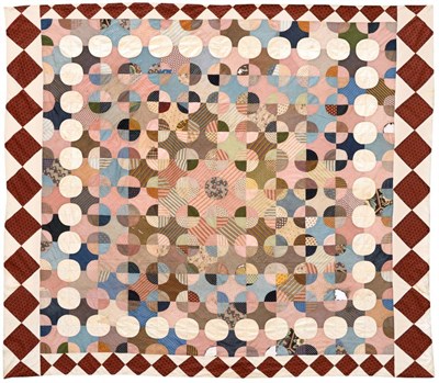 Lot 2052 - Circa 1810-1820 Patchwork Coverlet,  worked overall in a balanced design of quartered circles...